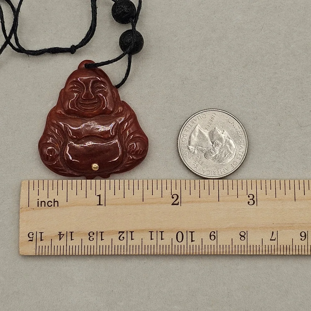 Carved Red Stone Laughing Buddha Pendant Black Cord Necklace Gold Tone Accent